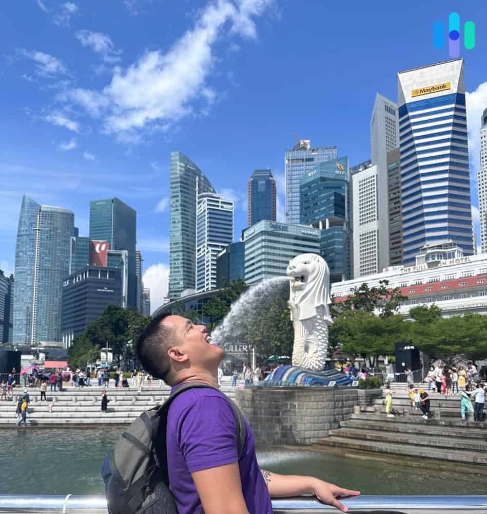 Our VPN expert, Brett, posing in front of the Merlion statue